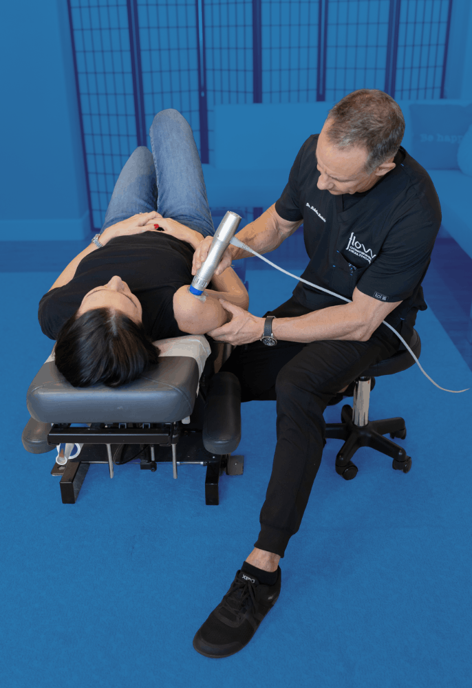Shoulder Shockwave Therapy Chiropractor Lafayette CO | Flow Concierge Healthcare